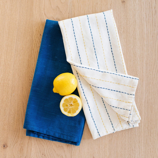 https://www.amshastudio.com/cdn/shop/products/hand-loomed-cotton-kitchen-towels-set-of-2-blue-pinstripe-920152_600x.jpg?v=1693807851