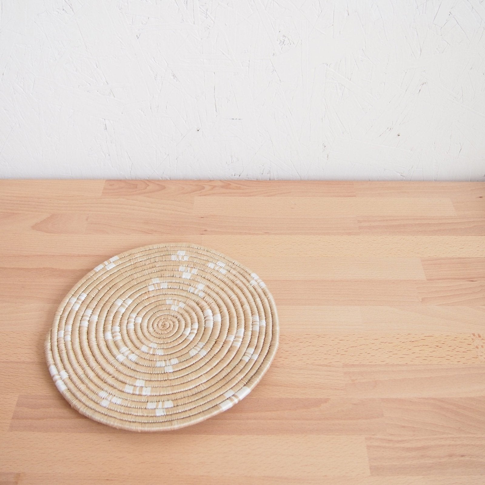 Ntamba Trivet - Amsha